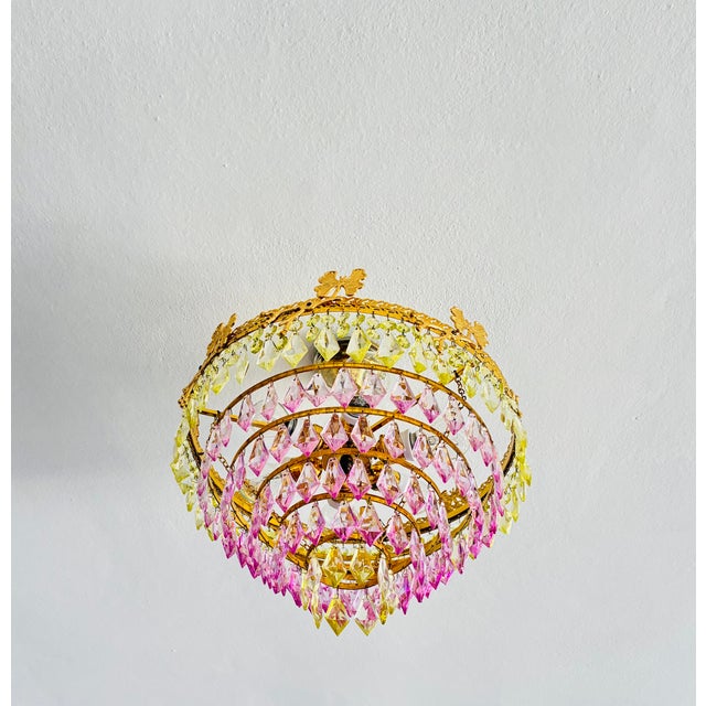1970s Vintage Brass Butterfly Crown Chandelier with Hand-Painted Pink & Green Crystals A rare and whimsical 1970s vintage...