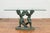 A Greco-Roman style contemporary bronze double cherub dining table base with Verde patina. The top is not included but...