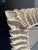 This is a great looking faux bamboo and palm leaf mirror. It features an outside band of large palm leaves and an inner...