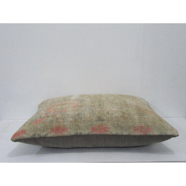 Decorative pillow cover made from a vintage Turkish handknotted rug. Backed with good quality cotton fabric. Pillow...