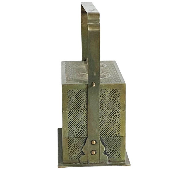 Superb old Three-tier, Chinoiserie-style, bronze box equipped with a stepped handle, and decorated with a high-relief...