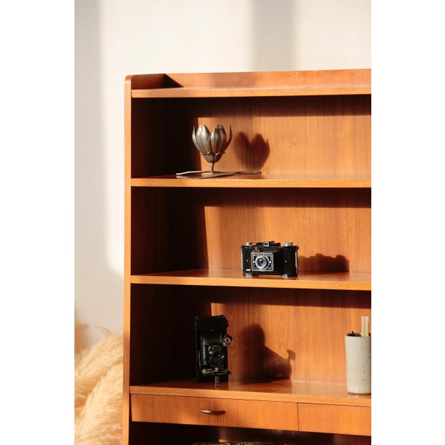 Mid-Century Scandinavian Secretary Bookcase This Scandinavian secretary bookcase transports you directly to the heart of...