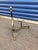 Offering a pair of brass French wrought andirons which came from Paris in the 1940's.