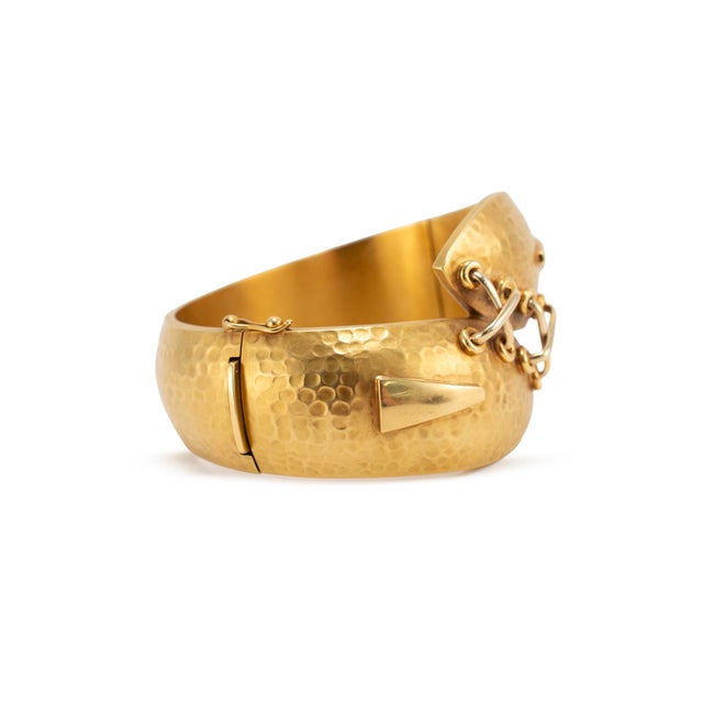 Gender: Ladies Metal Type: 18K Yellow Gold Length: 7.00 inches Width: 40.30 mm tapering to 20.15 mm Weight: 68.21 grams...