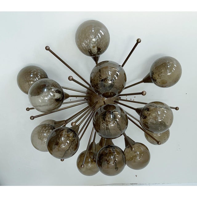 Italian sputnik flush mount with smoky Murano glass globes carefully hand blown with bubbles inside the glass using...