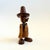 A vintage hand made wood bear. Quirky anthropomorphic features, wearing a hat. Articulating arms and neck with a rotating...