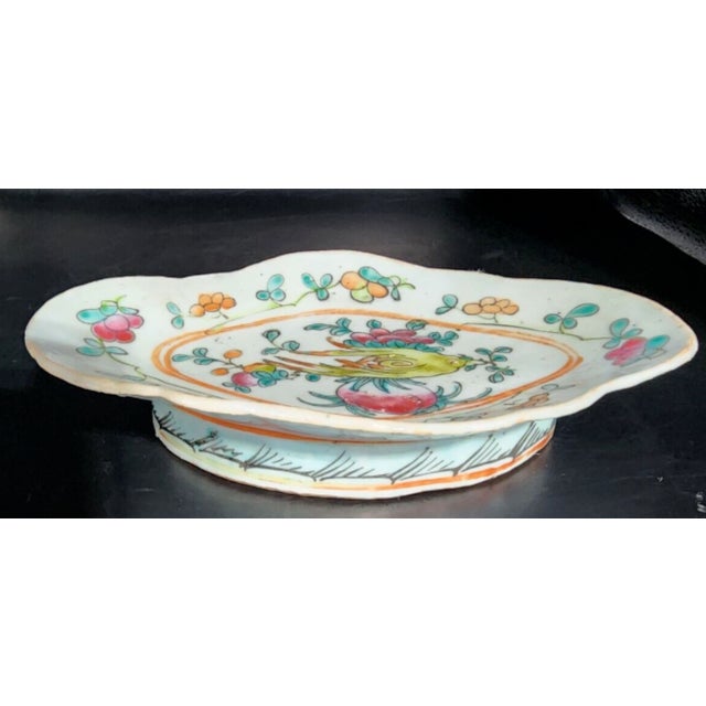 Excellent antique famille rose footed offering plate from China. Used in Buddhist temples and shrines, it would have held...