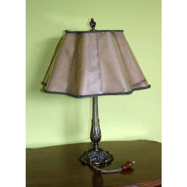 A beautiful desk lamp from the turn of the 20th century, manufactured in Neo-Baroque style, an example of historicizing...