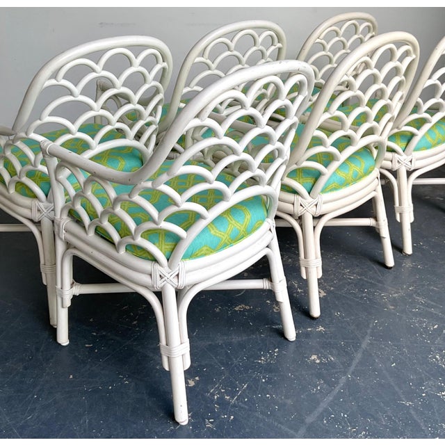 This set of six vintage dining chairs blends coastal charm with designer luxury. Crafted from sturdy rattan, each chair...