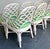 This set of six vintage dining chairs blends coastal charm with designer luxury. Crafted from sturdy rattan, each chair...