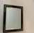 A petite, antique mirror with the charm of a French flea market find. Its late Victorian ebonized frame with subtle gilt...