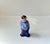 A figural decanter in hand-glazed porcelain. It depicts a jolly sailor or fisherman enjoying a cold one. Unknown...