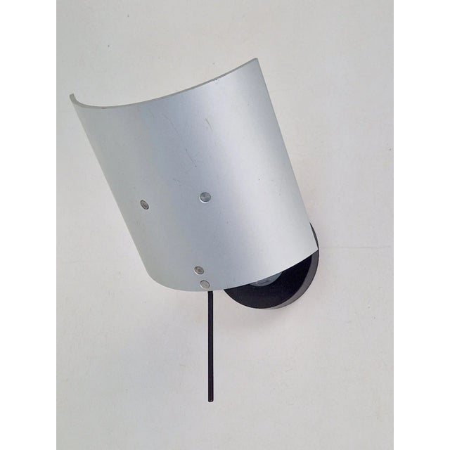 Vintage wall lamp "Enea" by Antonio Citterio for Artemide, 1980 The lamp can be tilted and turned in all kinds of...