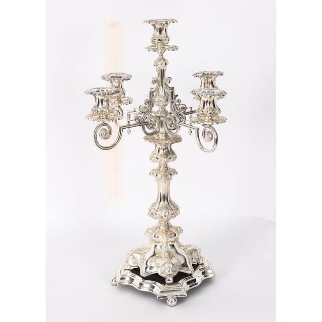 This is a beautiful large pair of Swedish antique silver plated, five light, four-branch table candelabra by A. G. DUFVA,...