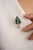 This is part of Chairish’s Fine Jewelry assortment. This 18K yellow gold Carved Leaf Emerald Diamond Pendant and Brooch...