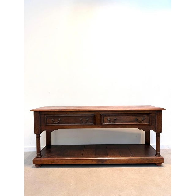A beautifully proportioned antique oak console or serving table , combining generous storage with a strong architectural...