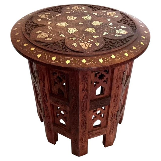 A highly decorative handmade Indian side table, crafted from richly toned dark rosewood and embellished with intricate...