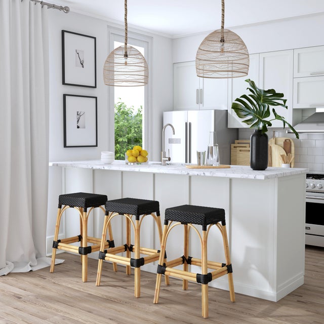 This backless stool measures 30" high, so it sits at just the right height for your bar seating. It has an intricately...
