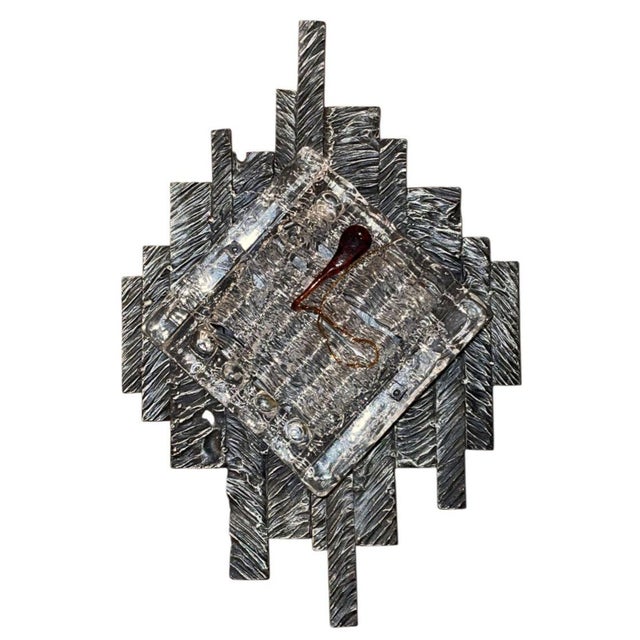 A striking pair of Italian Brutalist wall sconces designed by master glassmaker Albano Poli for Poliarte, executed in the...