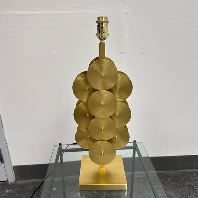 Design Plus Gallery presents the Puzzle Circles Table Lamp from Jonathan Adler. This sculptural table lamp is composed of...