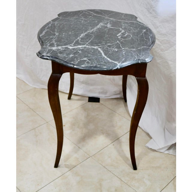 Vintage French Oak Table with Italian Marble Top. The marble has an ogee edge.