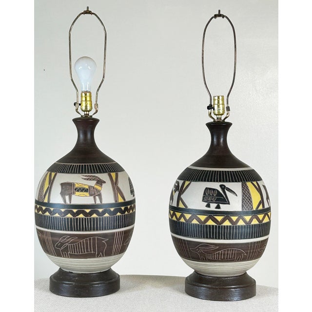 Very large Table lamp set 32" tall, 11.5" wide and 22" to the light switch. Large and bold circular bulbous design. This...