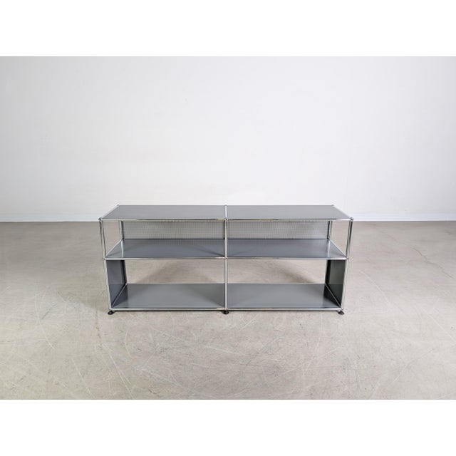 We are offering a beautiful USM Haller 2x2 sideboard/TV unit in medium gray for sale. The piece features four spacious...