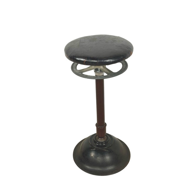 An exceptional early 20th-century adjustable dental operating stool manufactured by the Ritter Dental Manufacturing...
