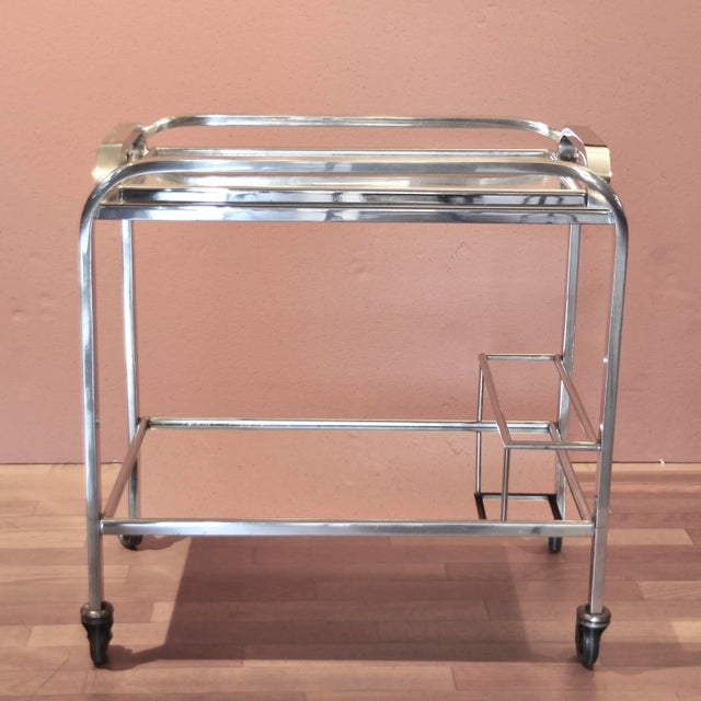 This modernist bar cart/trolley was probably designed by famous french Art Deco designer Jacques Adnet. France in the...