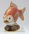 Elegant vintage Royal Crown Derby bone china figurine depicting a graceful golden carp/goldfish. Beautifully crafted with...