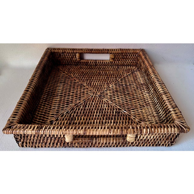This wonderful Brown woven rattan square tray features inset handles as shown. Great for serving, to use in a bar area,...