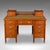 This is an antique estate manager's kneehole desk. A Scottish, golden oak and leather office desk, dating to the late...