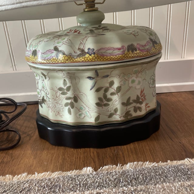 Charming lamp made from a ceramic hand painted fluted box.. Features a modern cord, custom shade and a matching finial..
