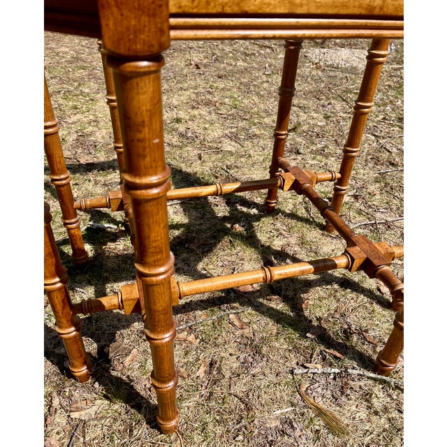 A distinctive, faux bamboo design by Lane. A finely crafted table, made of natural, hard rock maple. It has an octagon...