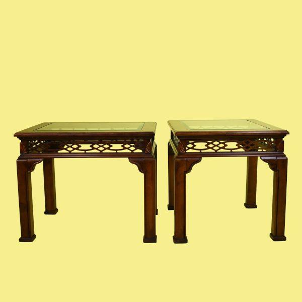 Add timeless elegance with this pair of Ming-style side tables. Crafted from dark mahogany-toned wood, each table features...