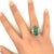 A captivating tourmaline weighing 9.68 carats is the centerpiece of this exquisite ring. It features a baguette-cut...