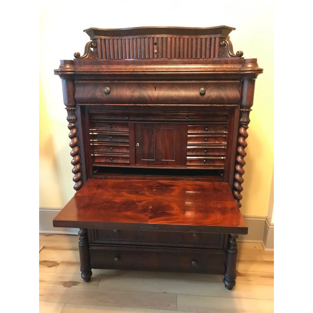 Spectacular German Mahogany Empire Secretary , circa about 1840..... has flame matched grain mahogany veneer. This desk...