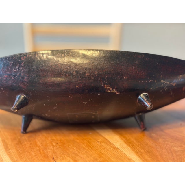 Striking vintage decorative bowl by Tony Evans, made in India and featuring the distinctive Evans Group mark on the...