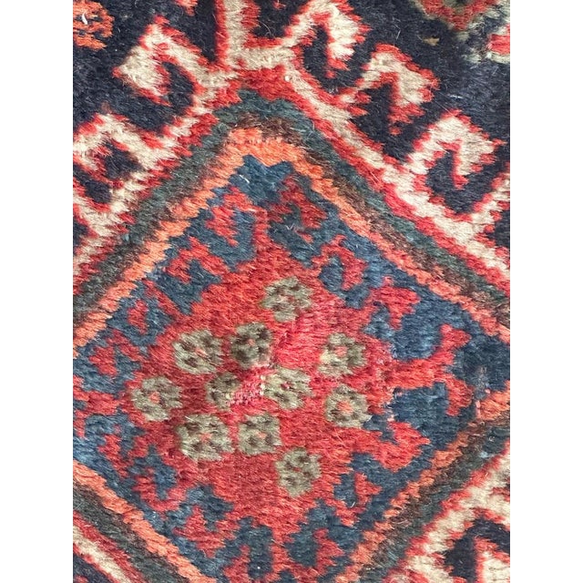 Nice antique qashqai fragment rug with beautiful geometrical and tribal design and nice natural colours with navy blue,...