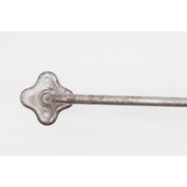 Vintage surface mount steel towel rack with a nickel finish and clover shaped backplates. The original mounting screws are...
