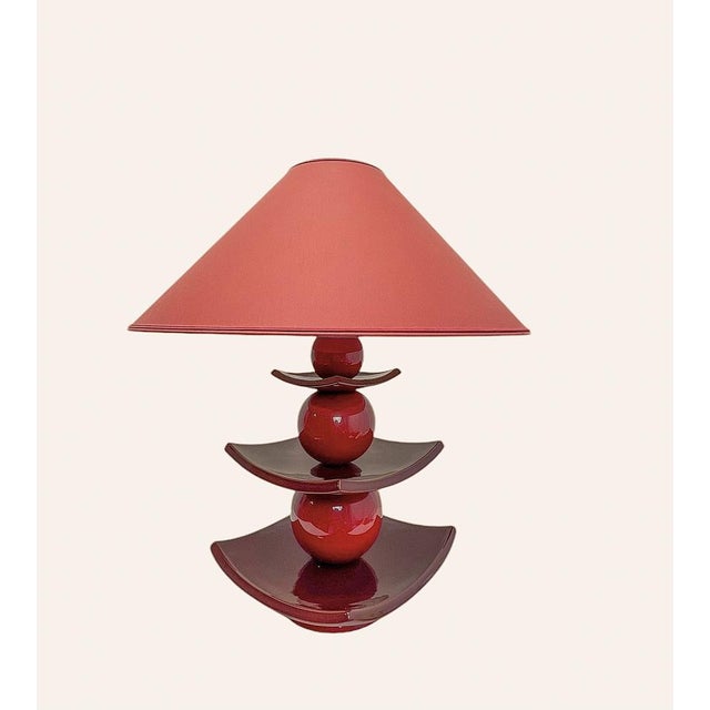Red Ceramic Pagoda shaped Table Lamp by Louis Drimmer Elevate your interior design with this striking red ceramic table...