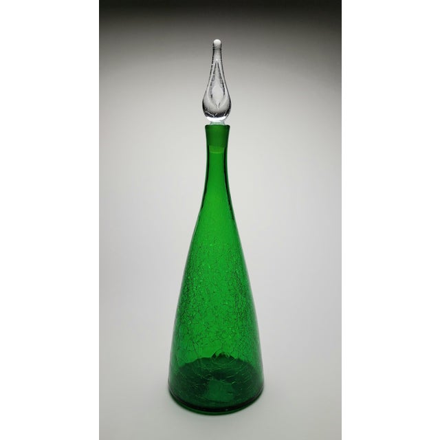 Georgeous green crackle glass decanter designed by Winslow Anderson for Blenko Art Glass Company cira late 1950's. This is...