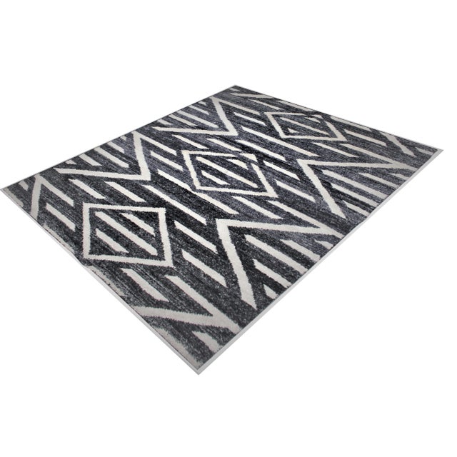 A beautiful handmade Bamboo silk rug. The geometric design woven in by Aara Rug hands. This rug is made of 75% bamboo silk...