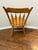 Crafted by the renowned S. Bent & Bros. of Gardner, Massachusetts, this beautifully preserved solid maple Windsor side...