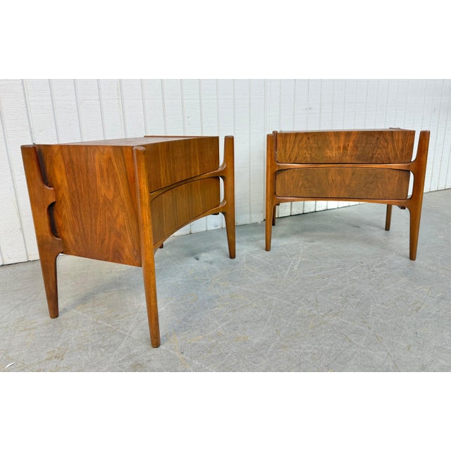 This listing is for a pair of Mid-Century Swedish Modern William Hinn Sculptural Walnut Nightstands. Featuring a floating...