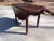 This antique table has beautiful, hand-turned legs with brass castors on the bottom. The rounded table leaves can be...