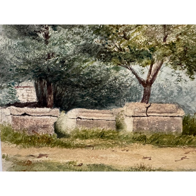 Original watercolor on paper depicting a tree-filled landscape with a tall cypress, stone wall, garden vegetation and a...