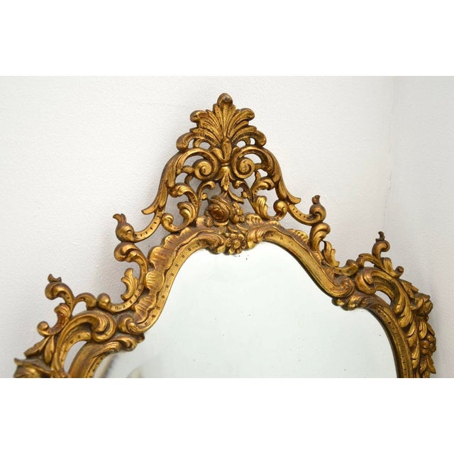 A stunning and extremely well made antique French gilt bronze mirror, dating from around the 1900-1920 period. This is of...