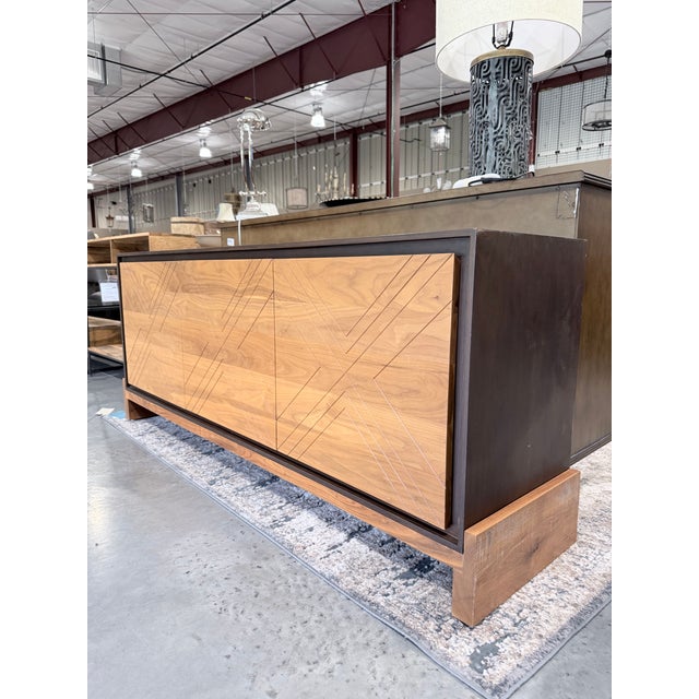A striking Lawson-Fenning sideboard that embodies the brand’s signature blend of architectural form and refined Mid-...
