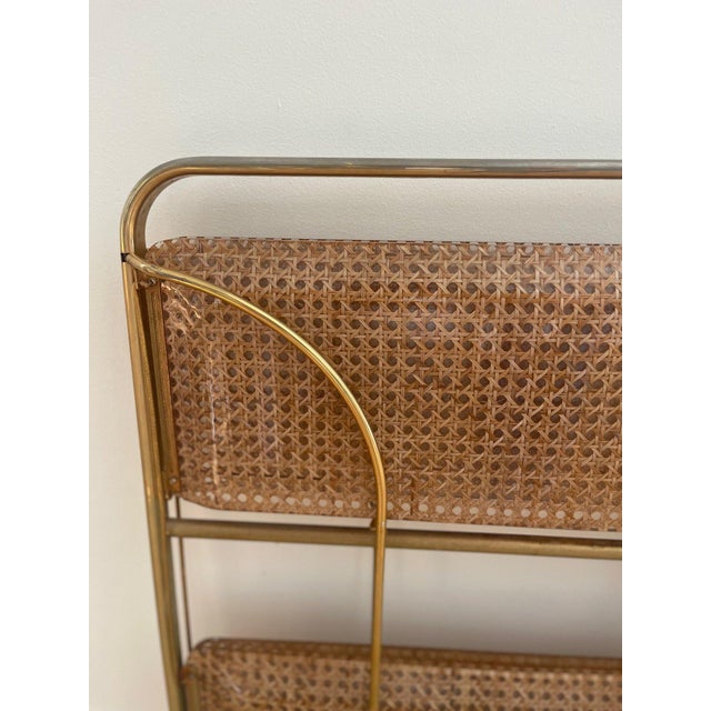 Lovely tea or bar cart which is foldable, perfect for easy storage for smaller spaces. Wicker encased in lucite with...